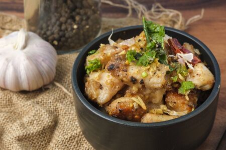 Fried chicken with garlic and pepper with rice. Thai Dish.の写真素材