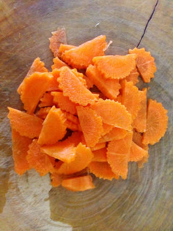 Slice carrot on wood boardの素材
