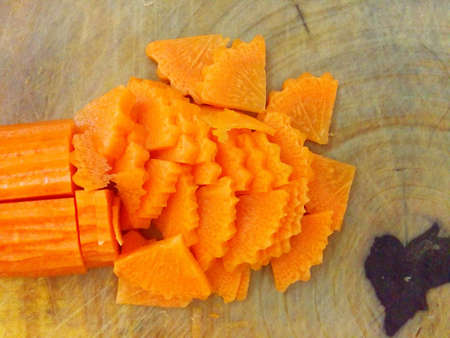 Slice carrot on wood boardの素材