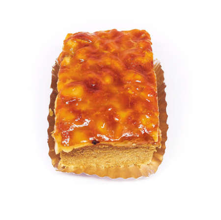 caramel cashew toffee cake isolation on white background. bakery homemade golden cakeの写真素材