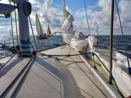 Sailing ship yachts with white sails in the open seaのeditorial素材