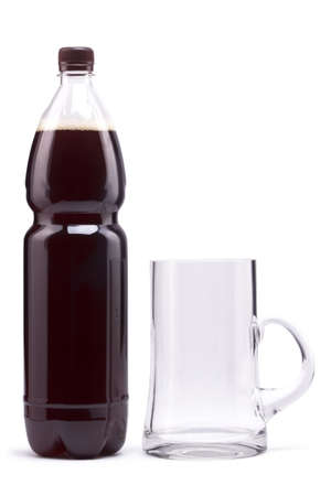 Bottle with dark beer and mugの写真素材