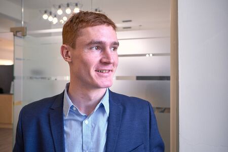 Mature European man with red hair in the officeの写真素材