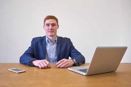 Mature european Man Using Laptop On Deskの写真素材