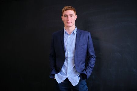 Mature European man with red hair on a black backgroundの写真素材