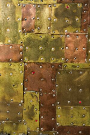 bronze metal texture with high details rivetの写真素材