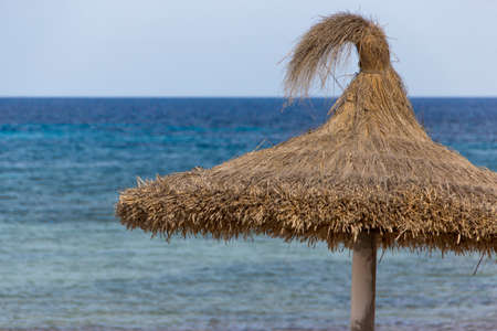 Umbrella on the waterの写真素材