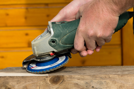 Grinding with angle grinderの写真素材