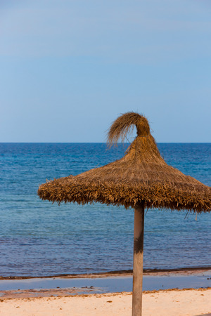 Umbrella on the waterの写真素材