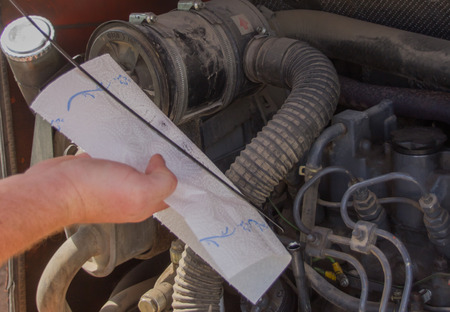 Maintenance of a mini excavatorの写真素材