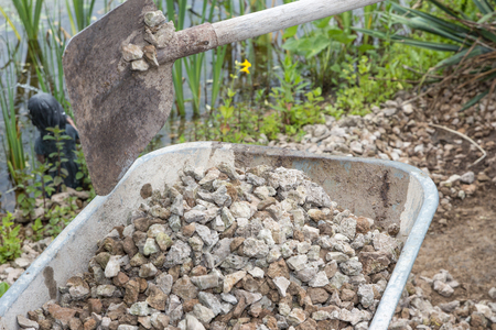 Wheelbarrow with stonesの写真素材