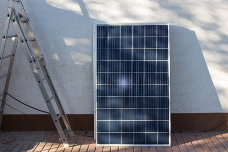 Mounting a solar panelの写真素材