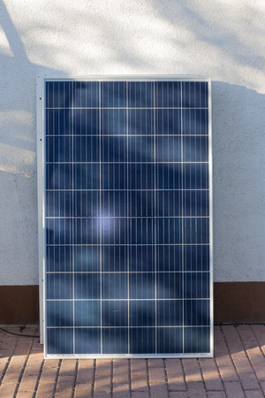 Mounting a solar panelの写真素材