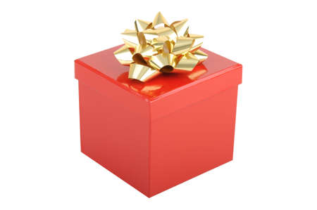 A red christmas gift box with a gold bow isolated on a solid white background.