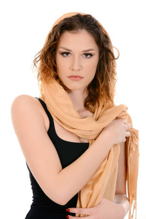 Beautiful woman wearing golden scarf isolated on white backgroundの写真素材