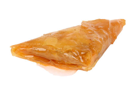 Sweet dessert triangular baklava isolated on white background.の写真素材