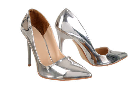 Silver high heel women shoes isolated on white.の写真素材
