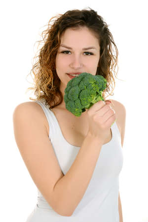 Young attractive woman holding broccoliの写真素材