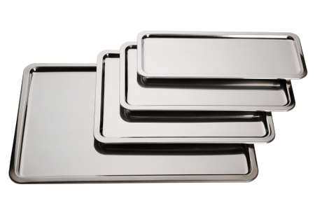 Set of stainless square trays on white background. Empty silver serving traysの写真素材