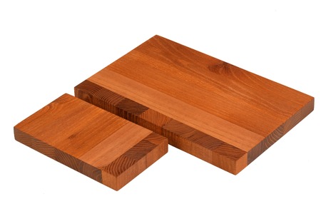 New two parts of rectangular wooden cutting board, isolated on white backgroundの写真素材