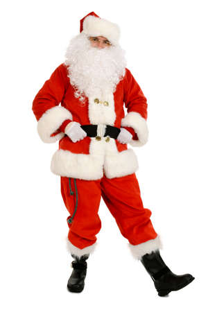 Traditional Santa Claus dancing holding his belt. Full length portrait of traditional Santa Claus isolatedの写真素材