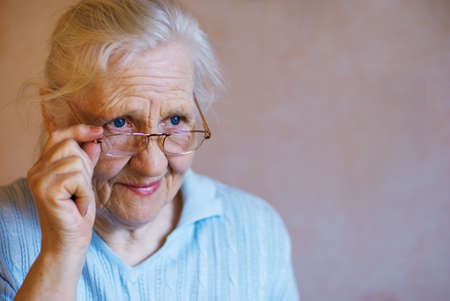 Elderly woman with glasses