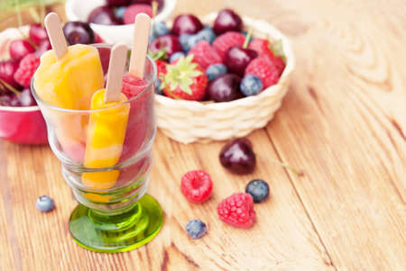 Homemade ice cream sorbet with different berries, blueberry, raspberry, strawberry and cherry,...