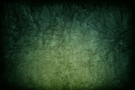 Abstract dark green color texture background with radial gradientの写真素材