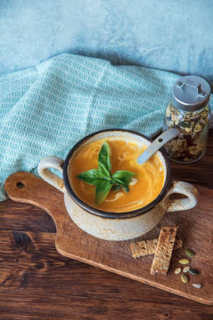 Tasty pumpkin soup, seasonal autumn food
