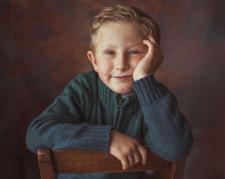 Portrait of a cute boy, at homeの写真素材