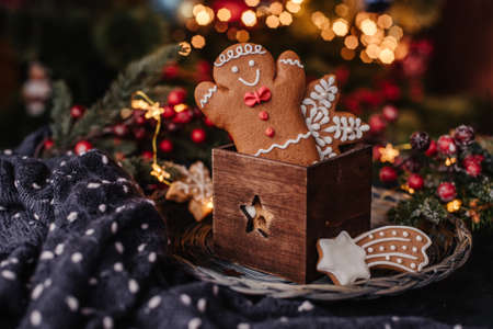 Christmas cookies and festive decor on the tableの写真素材