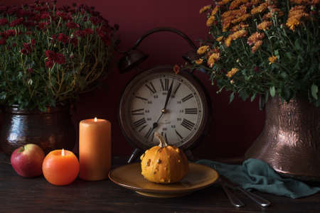 Thanksgiving table setting, autumn decor with pumpkins