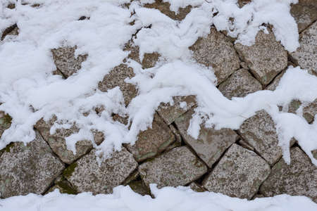 Snowy stone wallの写真素材