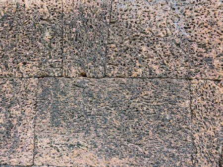 Laterite stone wall backgroundの写真素材