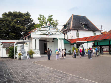 Yogyakarta, Indonesia - September 15, 2016: Tourists are entering the  main entrance of Palace of Sultan of Yogyakarta, the former ruler of Indonesia before the Dutch colonization of Indonesia.のeditorial素材