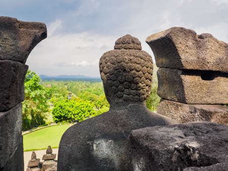 The Buddha statute at  Borobudur temple, Magelang Regency, near Yogyakarta, Java Island, Indonesiaの写真素材