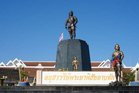 Uttaradit, Thailand- December 14, 2016: Monument of Phraya Phichai Dap Hak, Thai hero who fighting with Burmese troop until one of his sword was broken during the 18th century (Thai letters is the name of this monument)のeditorial素材
