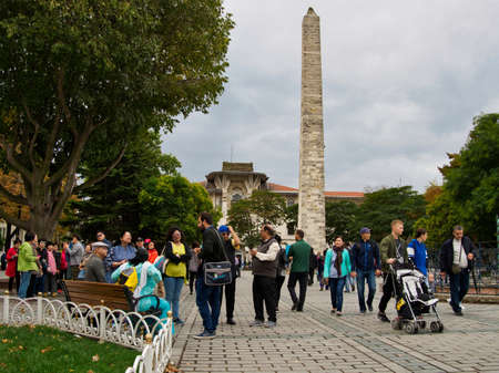 Istanbul, Turkey - October 11, 2018: People and tourists visiting the Column of Constantine VII in Sultanahmet square, Istanbul, Turkey.のeditorial素材