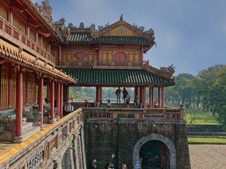 Hue, Vietnam - March 22, 2023: Tourists stand on the ground and the 2nd floor of the Meridian Gate of the Imperial Citadel in Hue, Vietnam.のeditorial素材