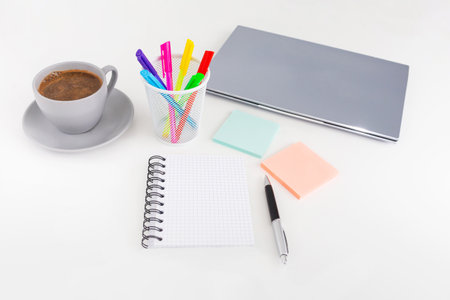 Office desk table with supplies, sticky notes and coloured pens. Top view with copy space. Flat lay. Time management. Office and business concept.の写真素材