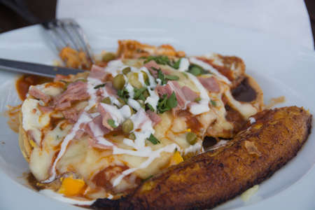 Huevos Rancheros with a twist Mexican style breakfast or brunch with fried banana, in Tulum Mexicoの写真素材