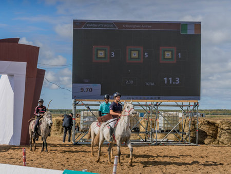 The group of horse riders, a mounted archers, at the race track of World Nomad Games, during the archery competition in Astana, Kazakhstan.の写真素材