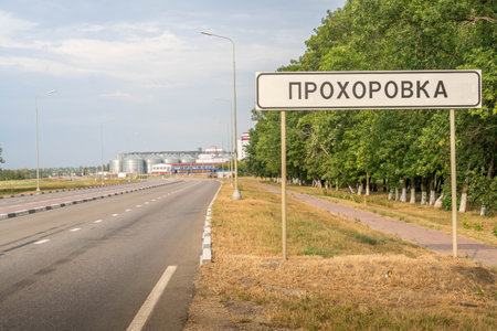 The street sign says "Prokhorovka" in Russian and the road going to Porkhorovka, Belgorod oblast at Western Russia.の写真素材