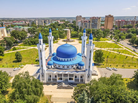 The beautiful mosque in Maykop, Adygea Republic at North Caucasus, Russia, with the green park, and...