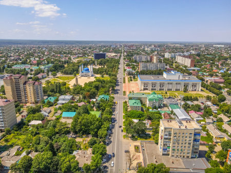 The aerial city view of Maykop, Adygea republic of Northern Caucasus of Russia, with the road, parks, Soviet residential buildings.の写真素材