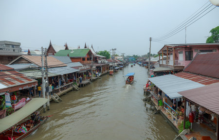 Samut Songkhram / Thailand - April 1 2018: Many People as tourists walking, shopping around at Amphawa floating market. It is one of the most popular floating markets in Thailand.のeditorial素材