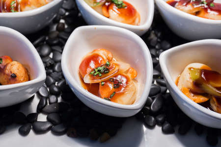 Scallops sea shell grilled leek with sauce teriyaki in Japanese styleの写真素材