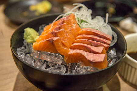 Hamachi Salmon Sashimi with shredded white radishの写真素材