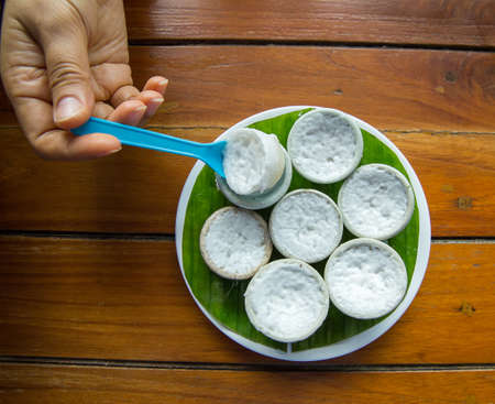 Thai Coconut Milk Custard - Khanom Thuai (Thai dessert) on wood backgroundの写真素材