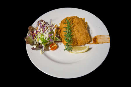 Deep Fried Dolly Fish Steak with Vegetable salad cream.